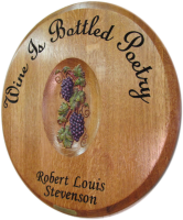 P1-WineIsBottledPoetry-Barrel-Head-Carving    